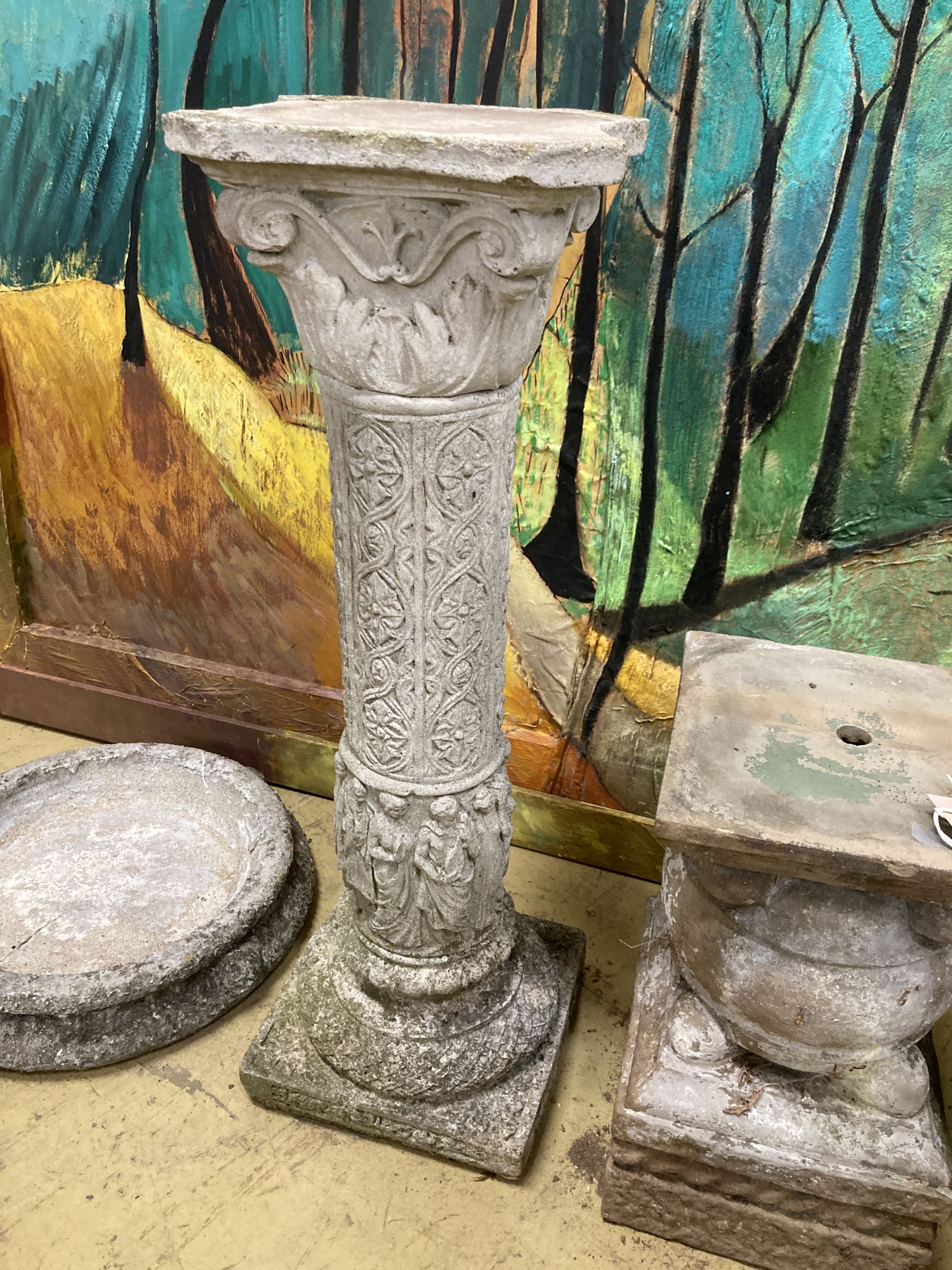 A reconstituted stone garden bird bath, 40cm diameter, height 78cm, a planter and a plinth